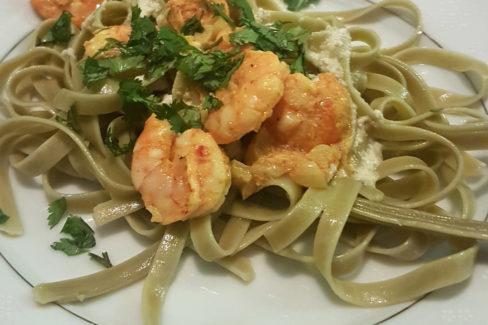 Butter & Garlic Prawns with Spinach Fettuccini and Cheese Sauce